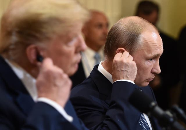 US President Donald Trump and Russia's President Vladimir Putin attend a joint press conference after a meeting at the Presidential Palace in Helsinki, on 16 July 16 2018