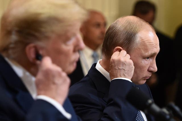 US President Donald Trump and Russia's President Vladimir Putin attend a joint press conference after a meeting at the Presidential Palace in Helsinki, on 16 July 16 2018