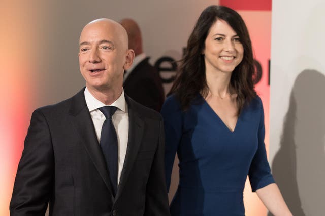 Amazon CEO Jeff Bezos and his wife MacKenzie Bezos at the headquarters of publisher Axel-Springer where he received the Axel Springer Award 2018 in Berlin, 24 April 2018