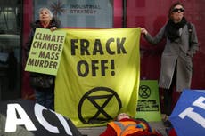 Climate activists celebrate suspension of all fracking in England