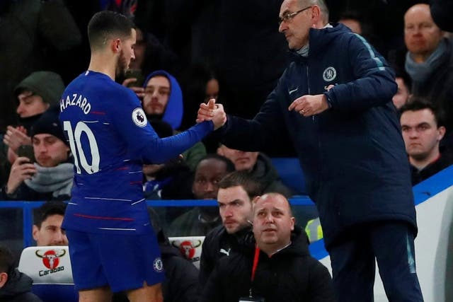 Chelsea's Eden Hazard shakes hands with manager Maurizio Sarri