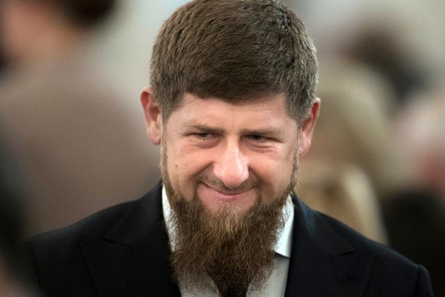 Chechen regional leader Ramzan Kadyrov smiles prior to president Vladimir Putin's annual state of the nation address in the Kremlin in Moscow, Russia