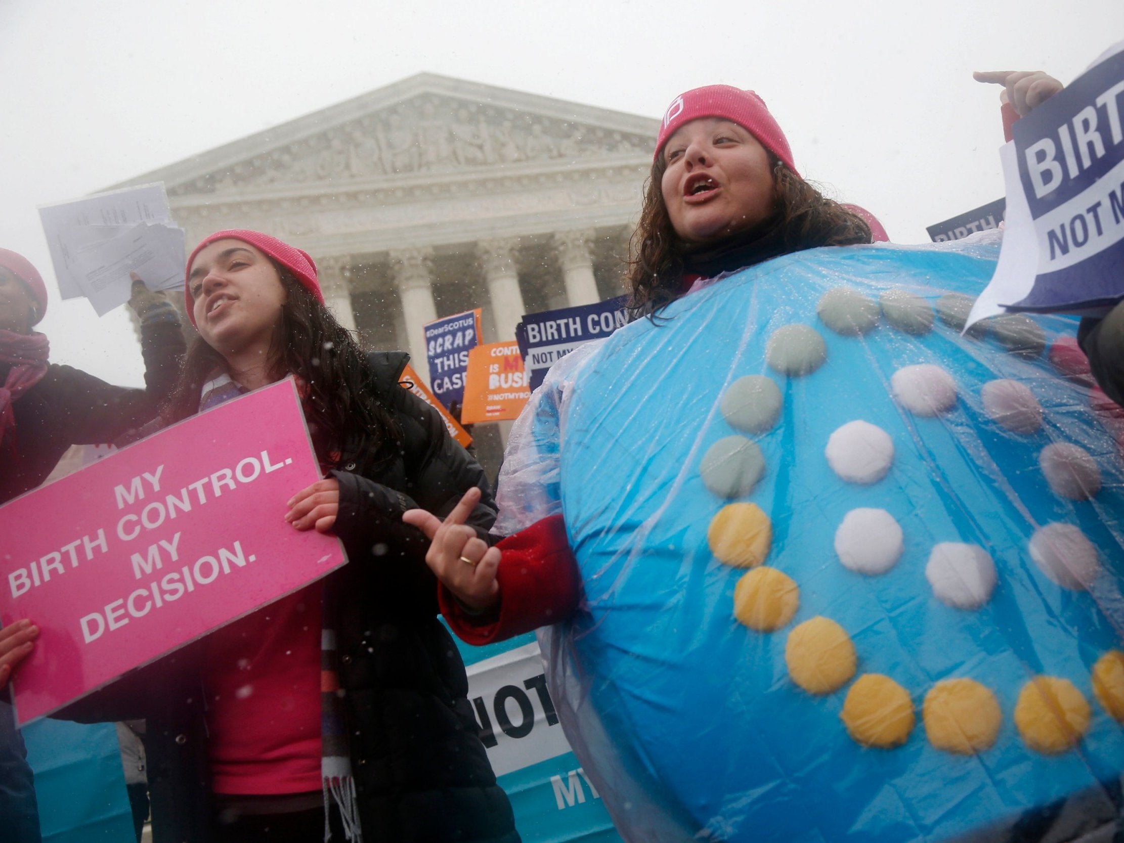 Reproductive rights campaigners protest outside the US Supreme Court in Washington in 2015