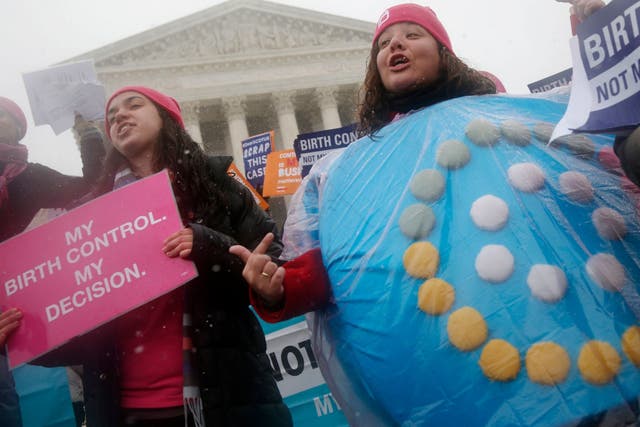 Reproductive rights campaigners protest outside the US Supreme Court in Washington in 2015
