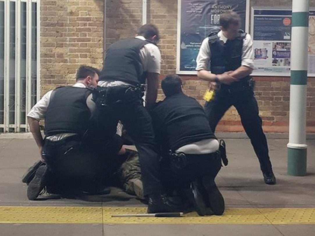 Officers discharged a Taser as they detained a man on the platform at the station.