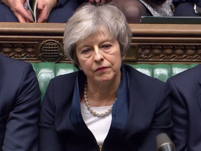 Theresa May reacts as Jeremy Corbyn informs MPs he has tabled vote of no confidence