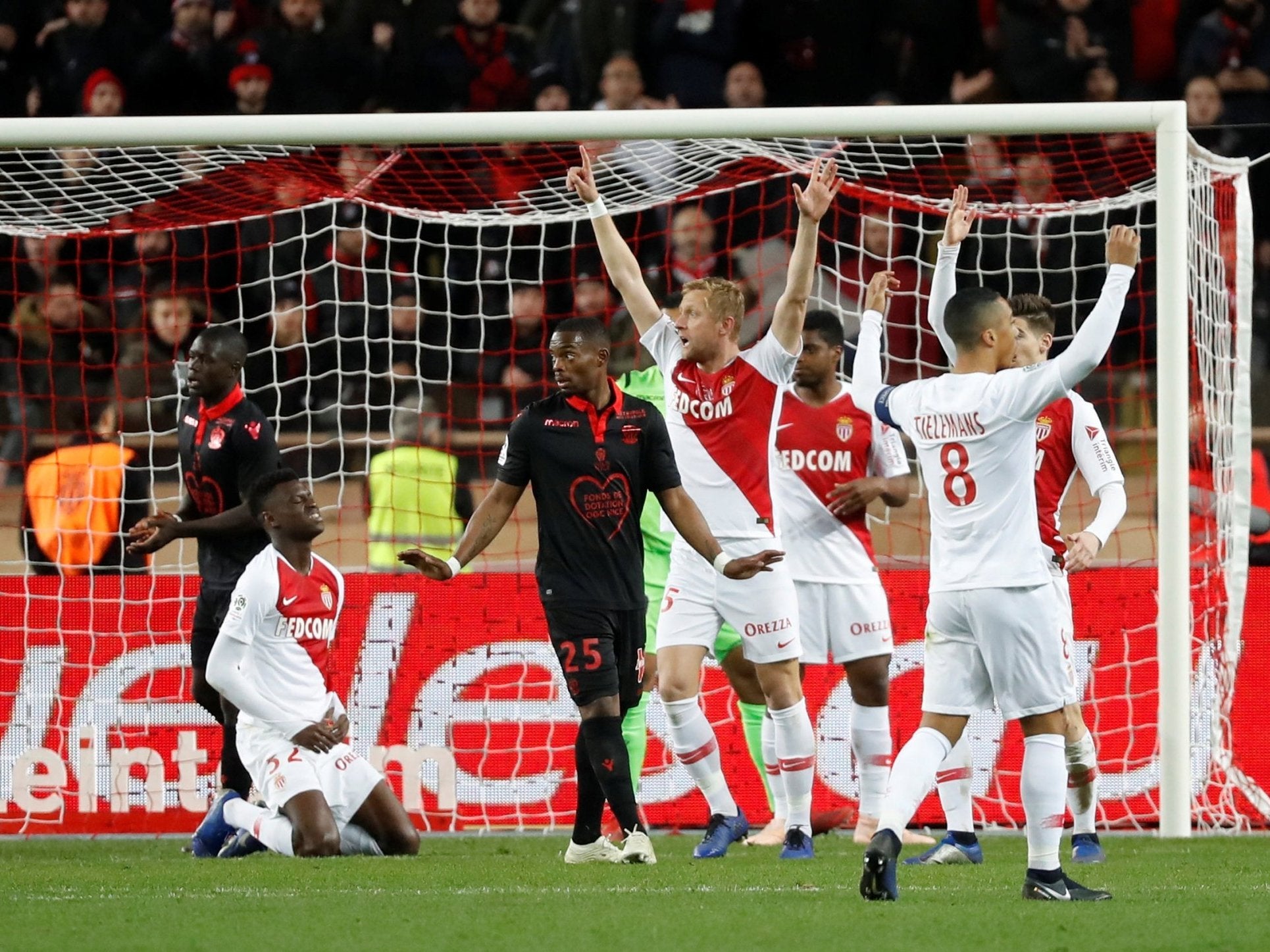 Monaco's Benoit Badiashile celebrates scoring their first goal