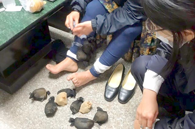 A Taiwanese woman was caught with 24 gerbils strapped to her legs