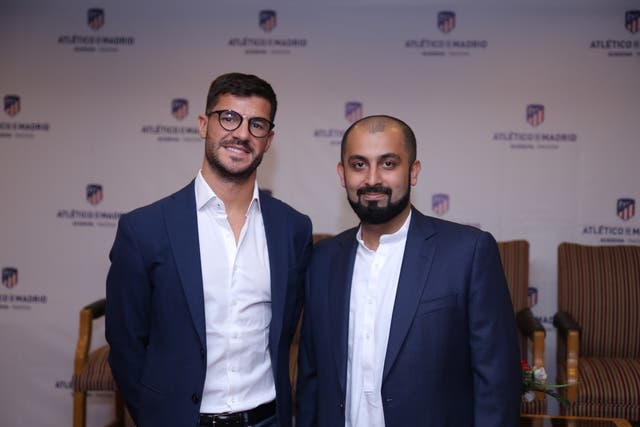  Atletico Madrid's international academy manager Fernando Lobete (L) with Lahore Academy's CEO Muhammad Atta Tanseer