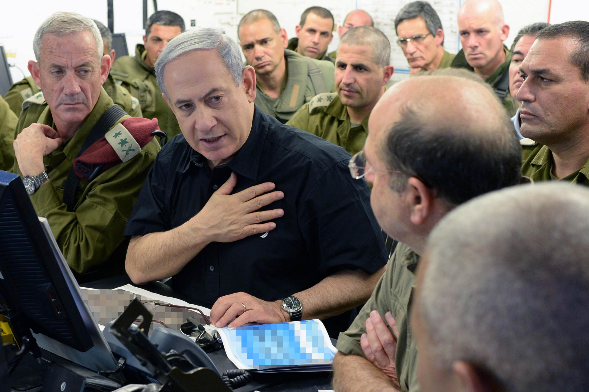 Netanyahu in 2014 with Benny Gantz (now his election rival). Gantz is second in the polls to the prime minister, who still expected to win (Israeli Government Press Office/Anadolu Agency/Getty Images)