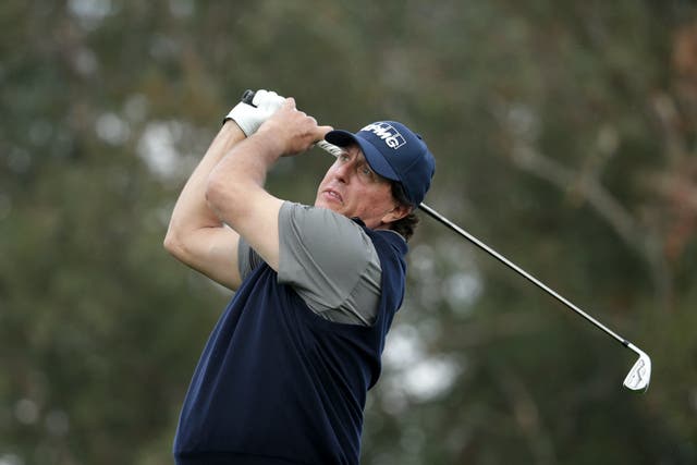 Phil Mickelson leads the Desert Classic by three shots after a career best-equalling 60