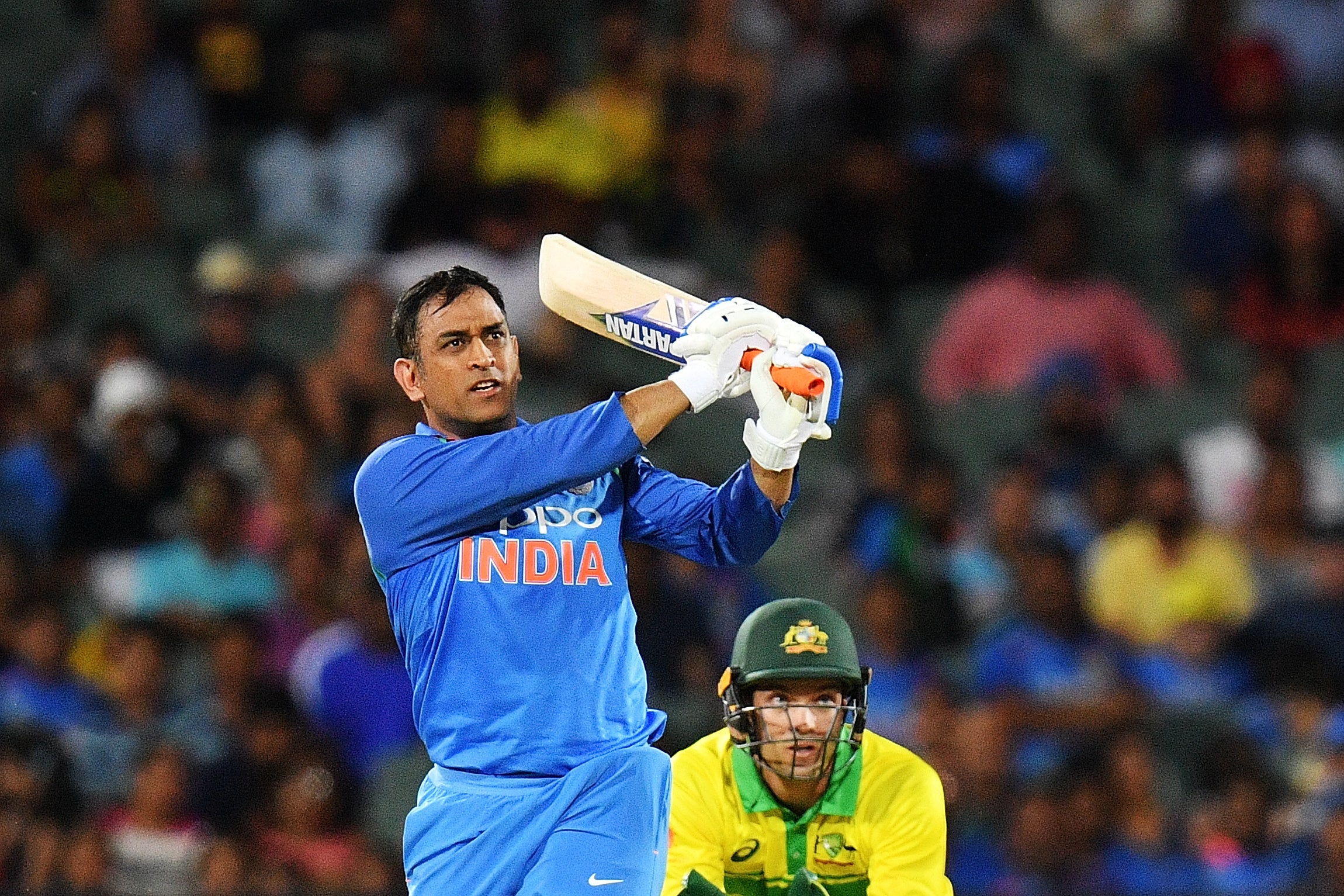 MS Dhoni whipped off his helmet and led India to victory in Adelaide, even as his nation doubted him