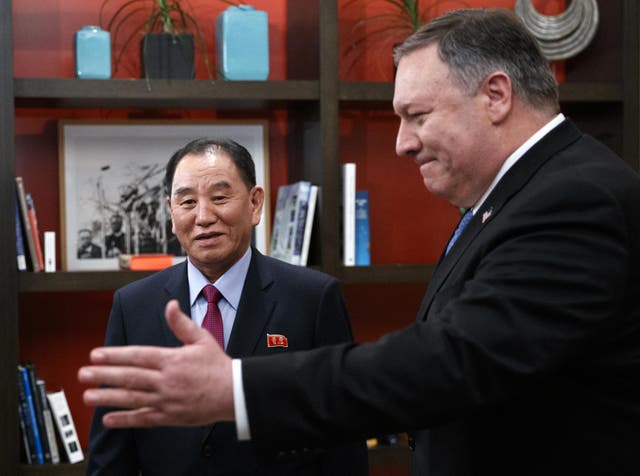 Secretary of State Mike Pompeo, right, and Kim Yong Chol, a North Korean senior ruling party official and former intelligence chief, walk from a photo opportunity at the The Dupont Circle Hotel in Washington