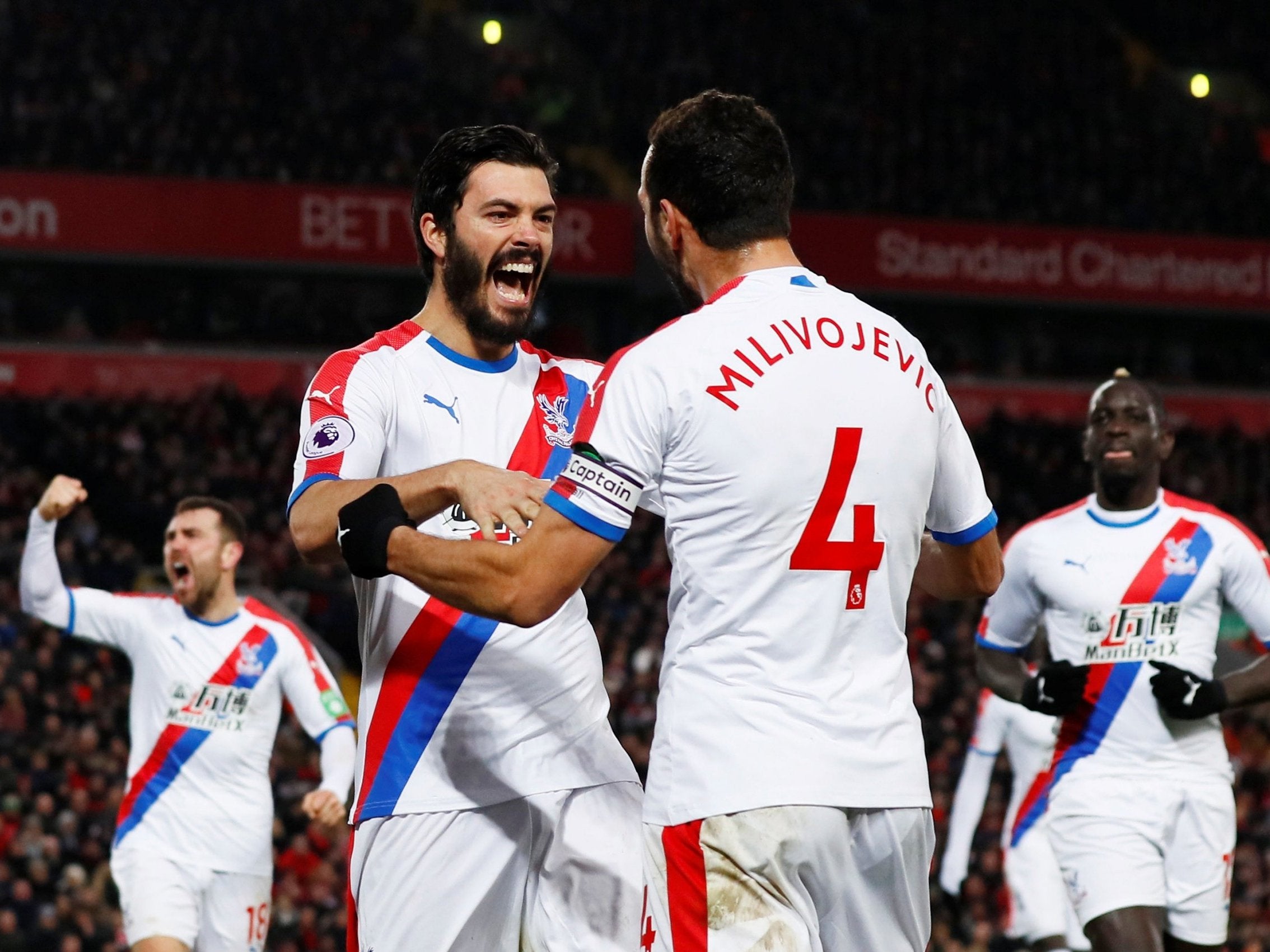 James Tomkins celebrates after equalising for Crystal Palace against Liverpool