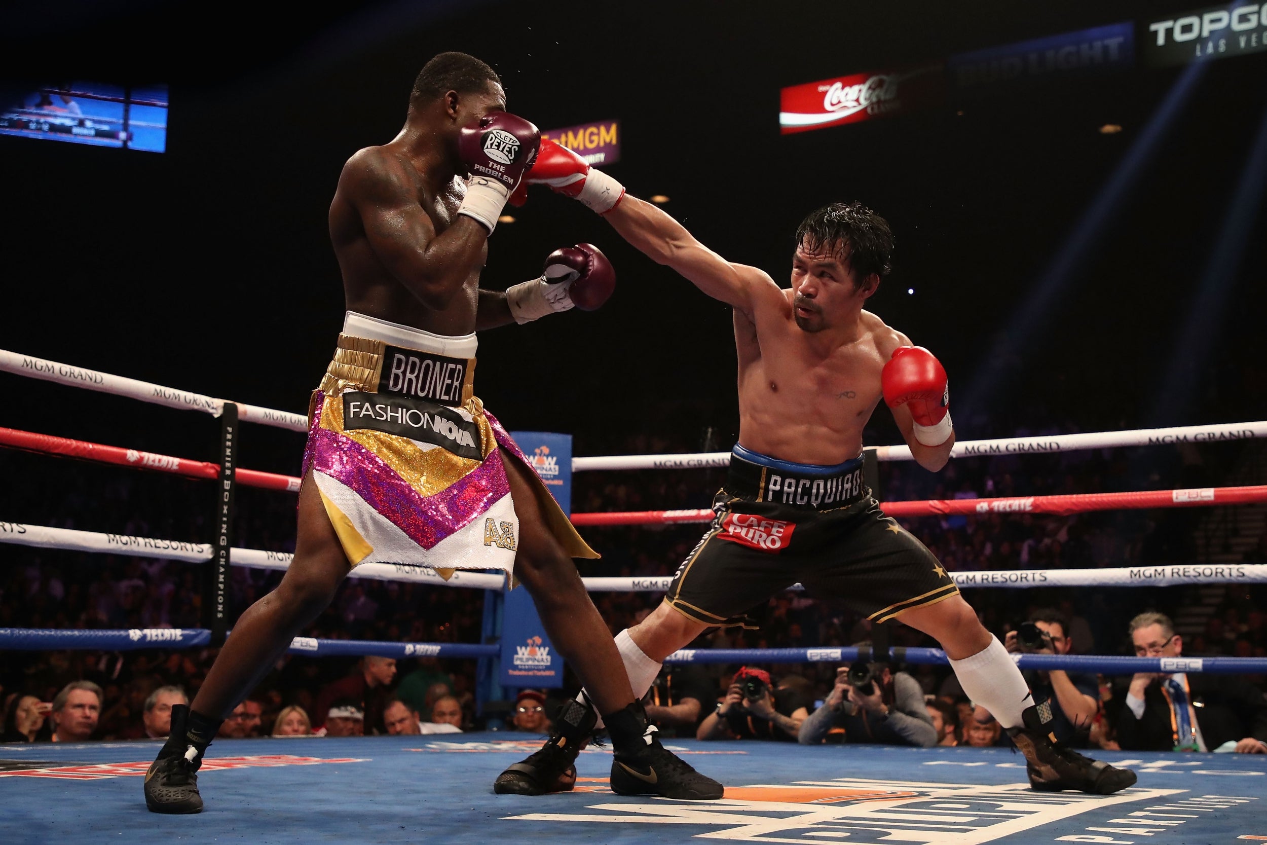 Manny Pacquiao (right) punches Adrien Broner in their 2019 welterweight fight