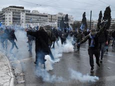 Violence breaks out in Athens as 60,000 protesters clash with police