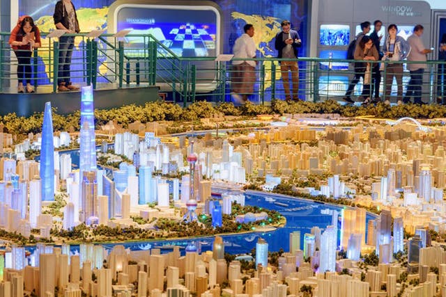 Shanghai’s urban room with a planning model of the city
