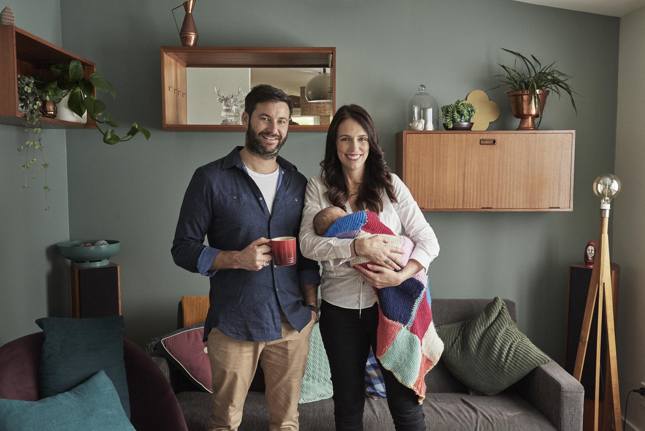 Prime Minister Jacinda Ardern and partner Clarke Gayford pose with their baby daughter Neve Gayford at their home on 2 August 2018