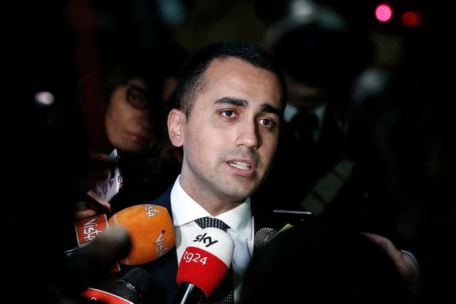 Luigi Di Maio speaks with journalists in Rome following his comments about immigration