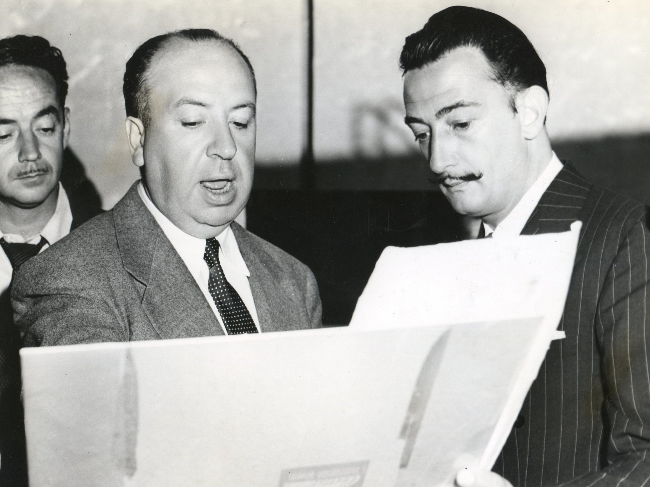 The artist (right) with director Alfred Hitchcock. Dali designed sets and costumes for a 20-minute dream sequence in ‘Spellbound’ – but only three minutes made the final edit