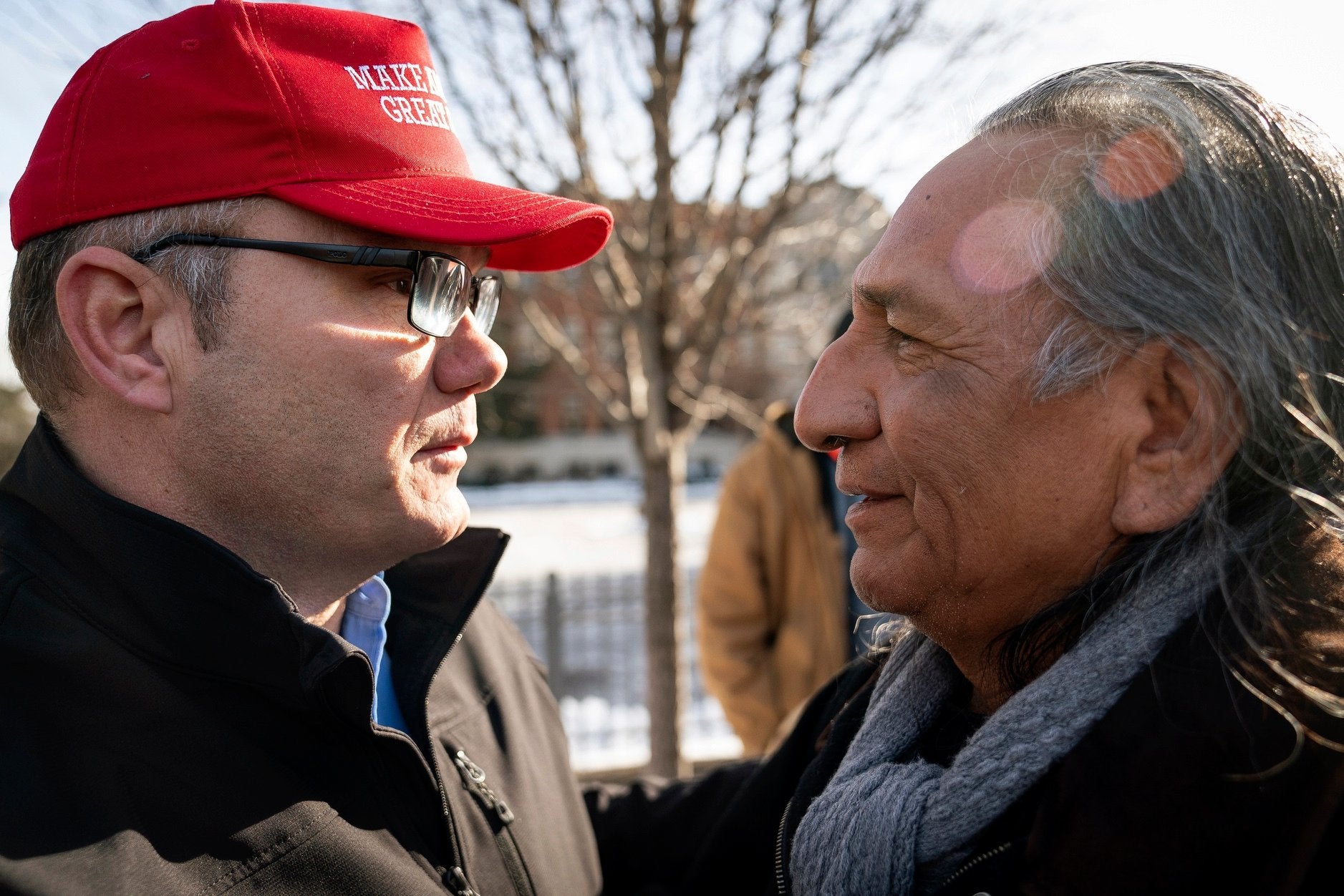 Guy Jones, left, and a supporter of President Donald Trump named Don embrace during a gathering of Native American supporters
