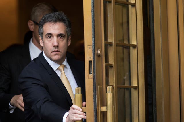 Michael Cohen leaves Federal court in New York on Aug. 21, 2018, after pleading guilty to charges including campaign finance fraud stemming from hush money payments to porn actress Stormy Daniels and ex-Playboy model Karen McDougal.