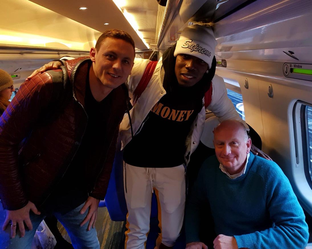 Nathan's dad poses with Paul Pogba and Nemanja Matic