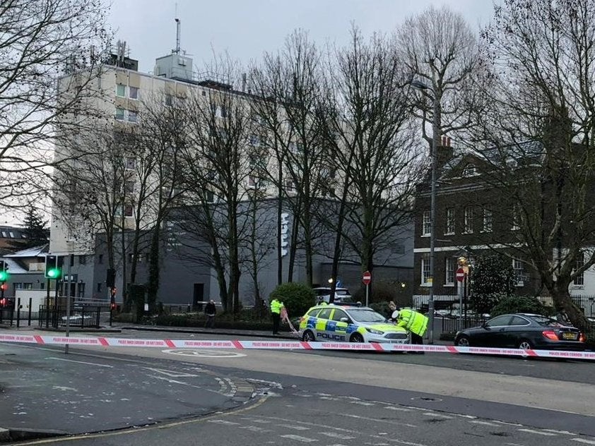 Police in Forest Road, east London, after a 26-year-old woman was killed by a police car