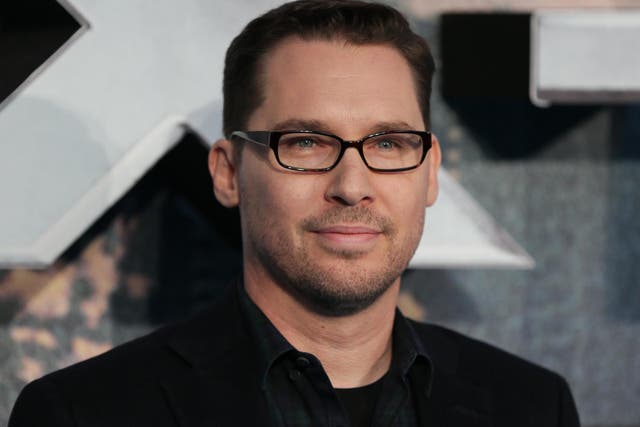 Bryan Singer poses on arrival for the premiere of X-Men Apocalypse in central London on 9 May, 2016.