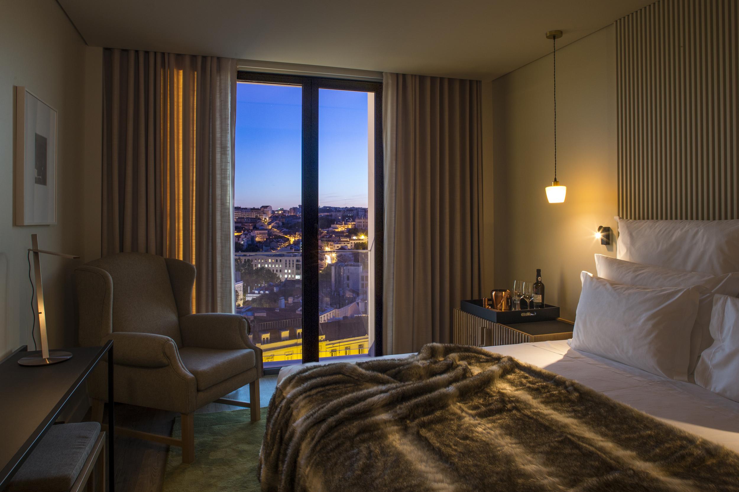 A superior room with a city view at the romantic Memmo Principe Real