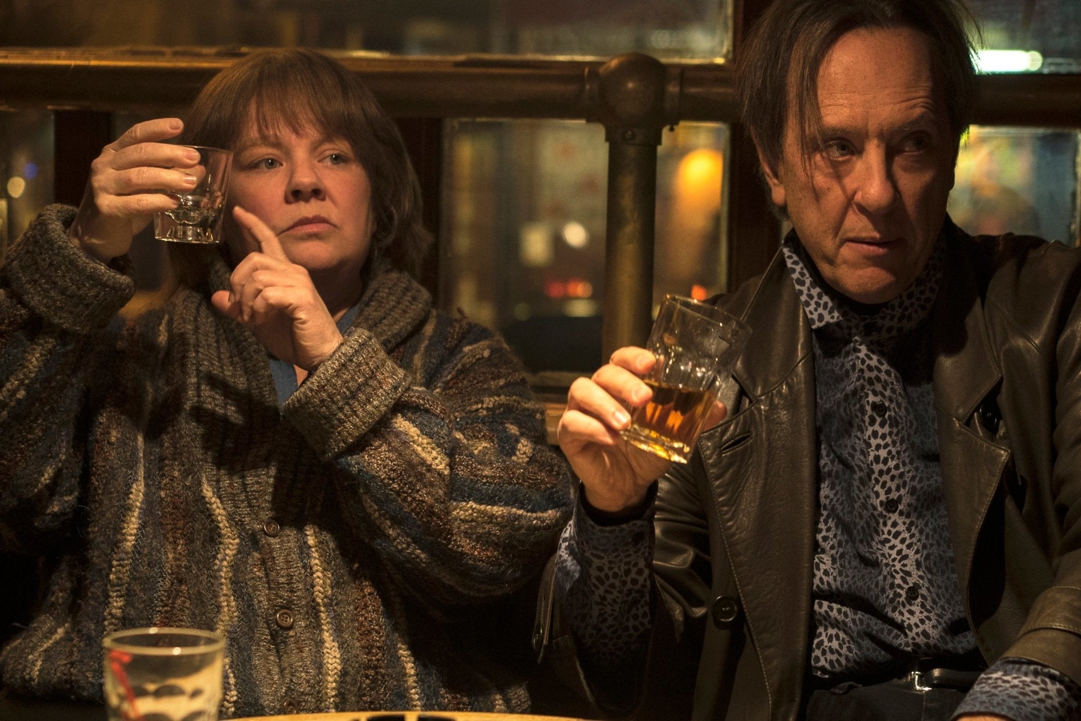 Cheers! Grant and Melissa McCarthy in ‘Can You Ever Forgive Me?’ (Twentieth Century Fox)