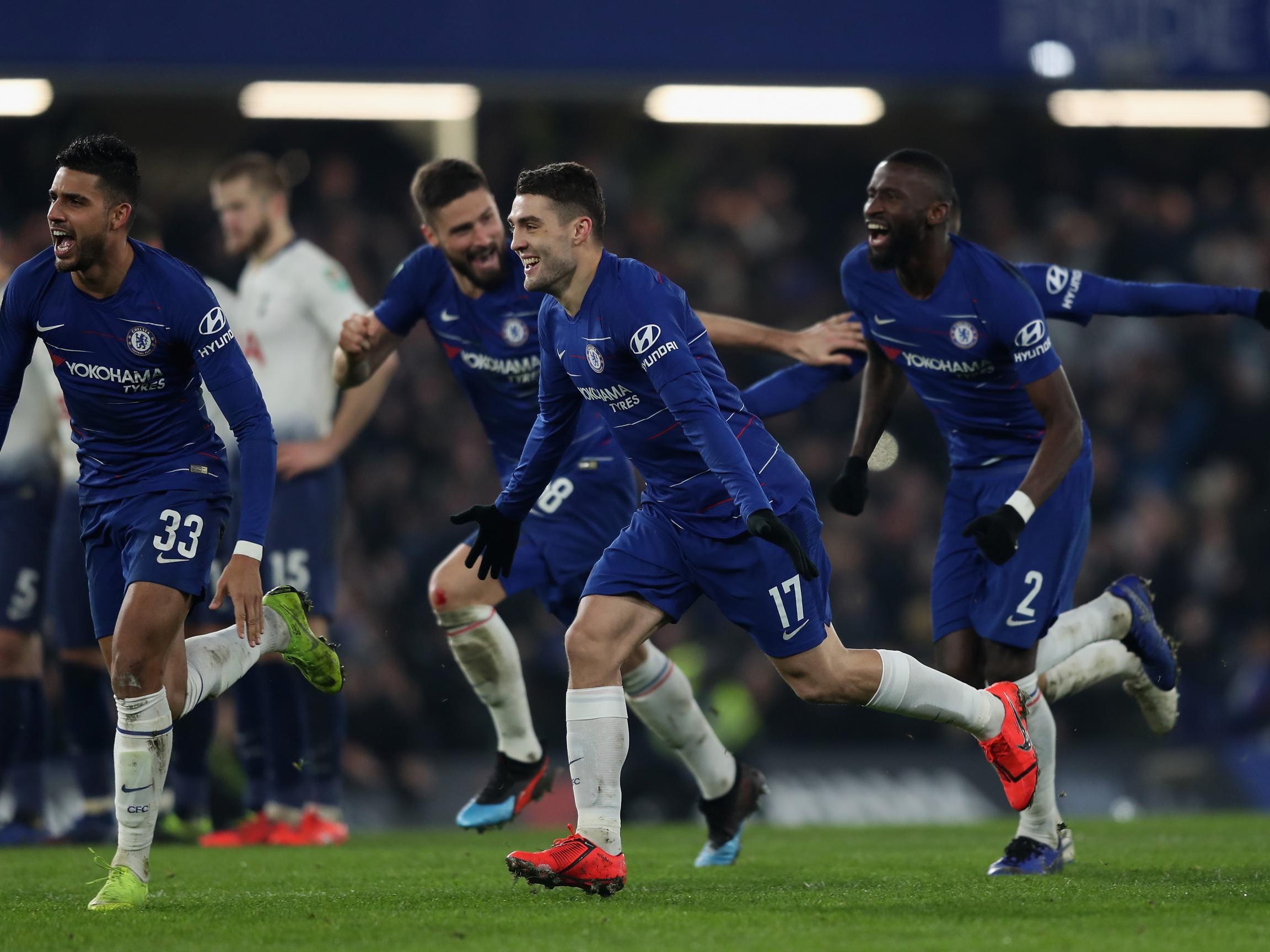 Chelsea celebrate after David Luiz scored the winning penalty