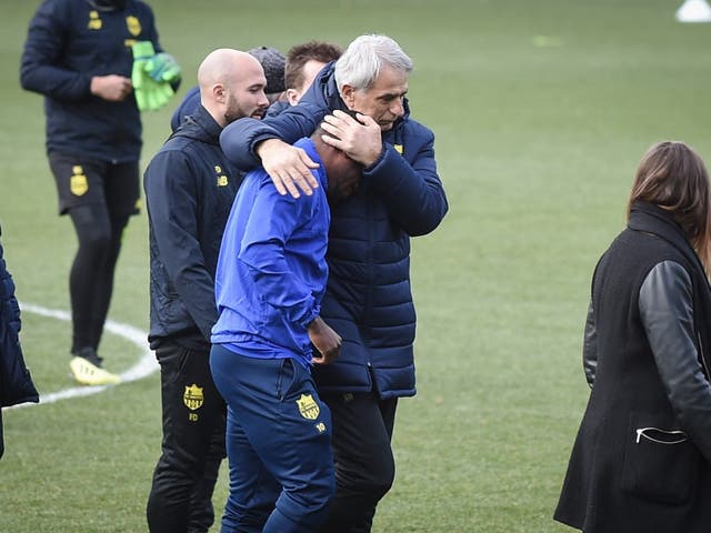 Nantes head coach Vahid Halilhodzic comforts Majeed Waris after news of the search for Emiliano Sala being called off