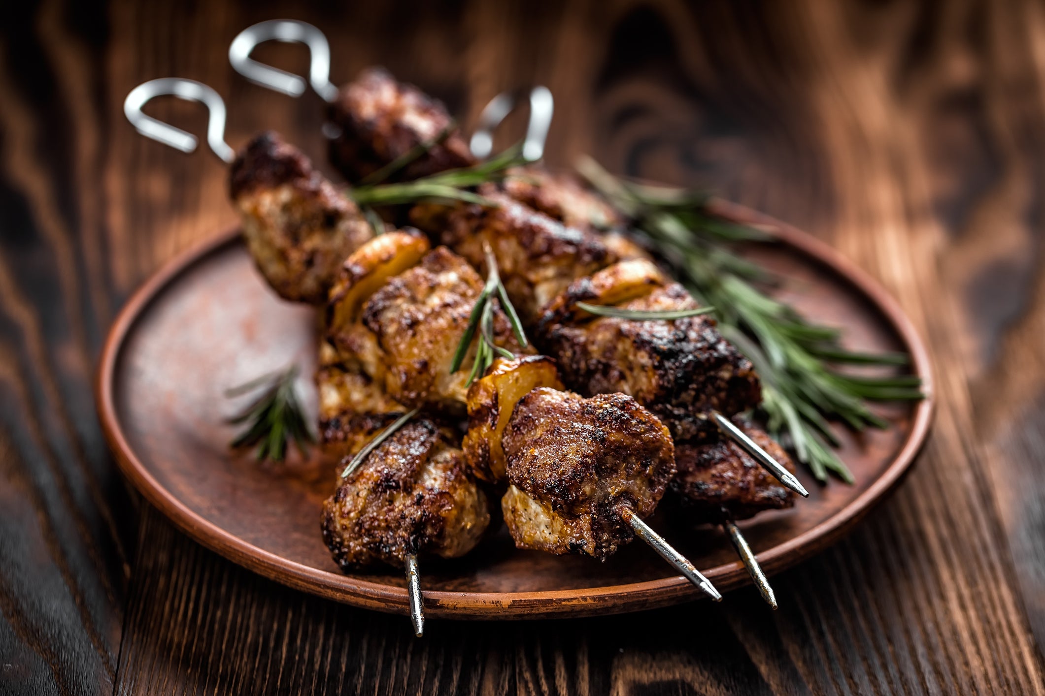 Shish kebab on wooden table