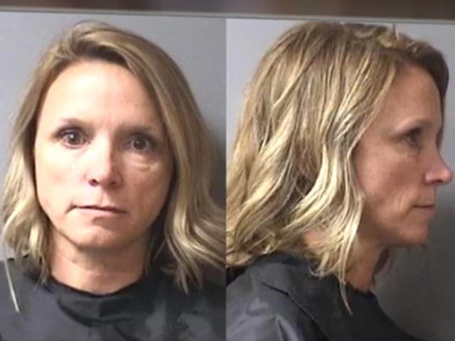 Casey Smitherman was charged with felony insurance fraud after paying for a sick student's treatment with her son's insurance