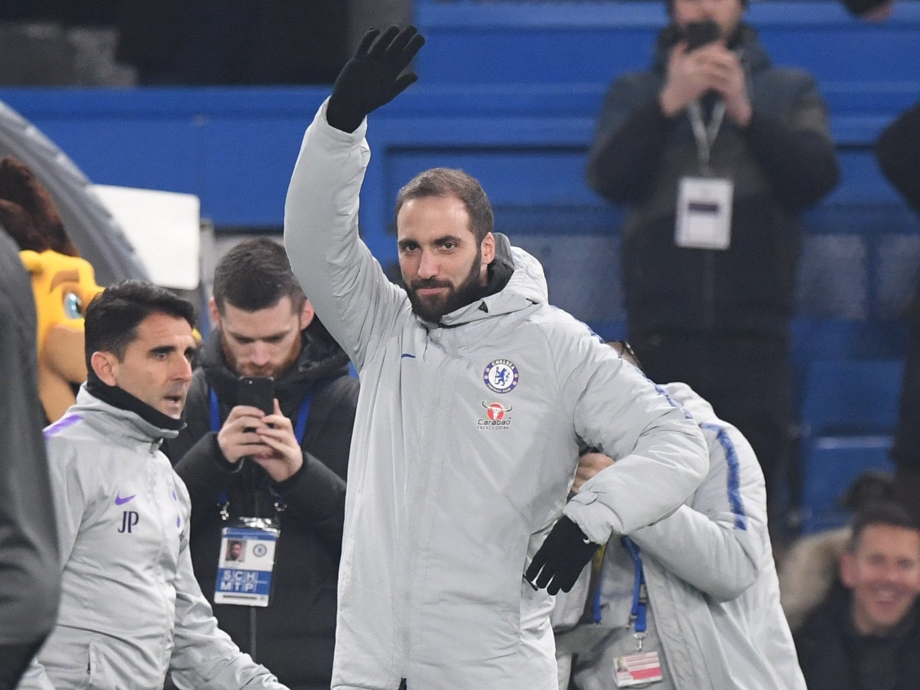 Gonzalo Higuain acknowledges the Chelsea fans after being unveiled