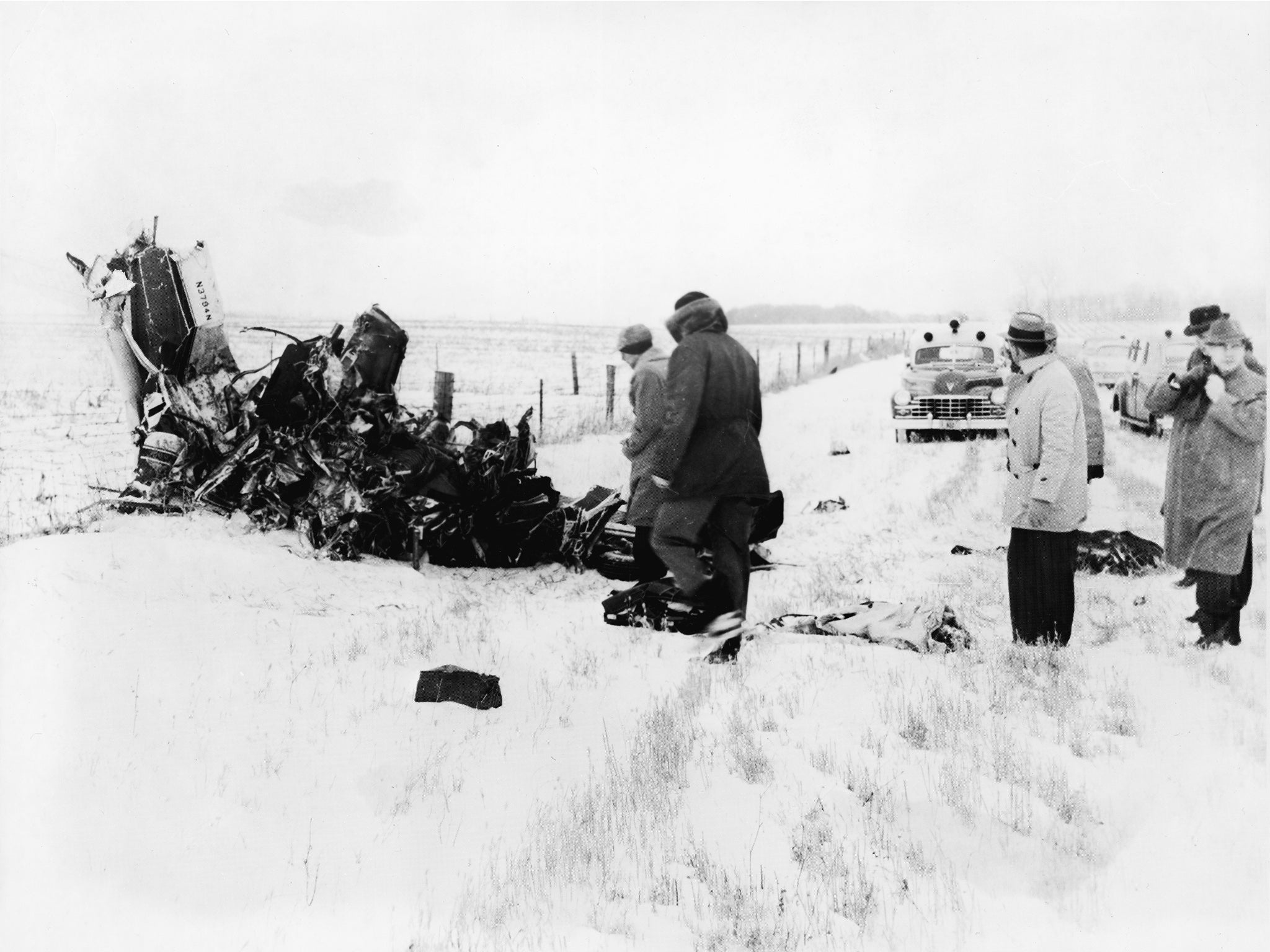 The wreckage of the Beechcraft Bonanza airplane in a snowy field outside of Clear Lake, Iowa, on 3 February 1959
