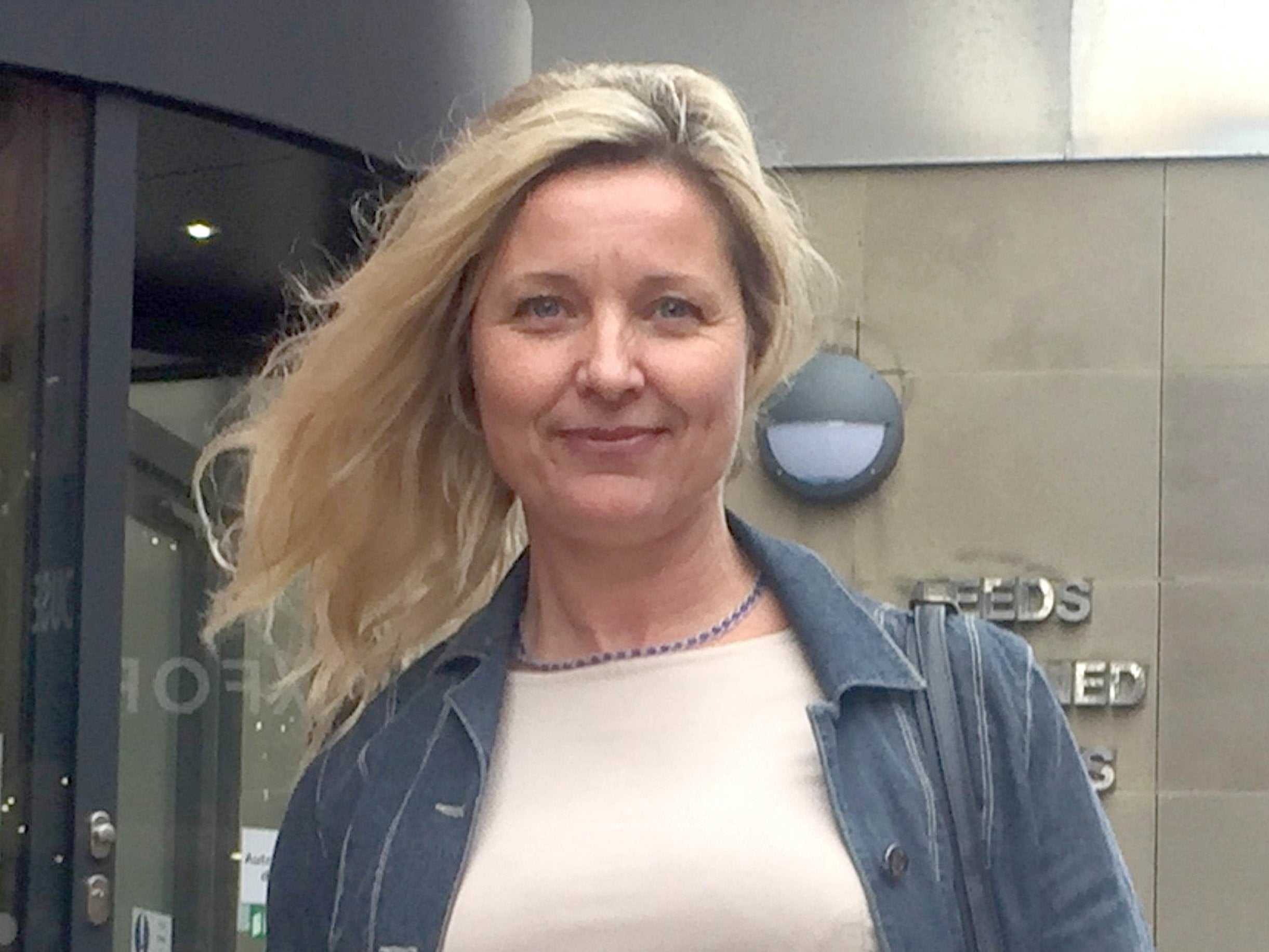 Carol Higgins smiles outside Leeds Crown Court after seeing her father Elliott Appleyard jailed