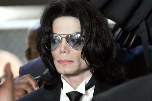 Michael Jackson prepares to enter the Santa Barbara County Superior Court to hear the verdict read in his child molestation case June 13, 2005 in Santa Maria, California.