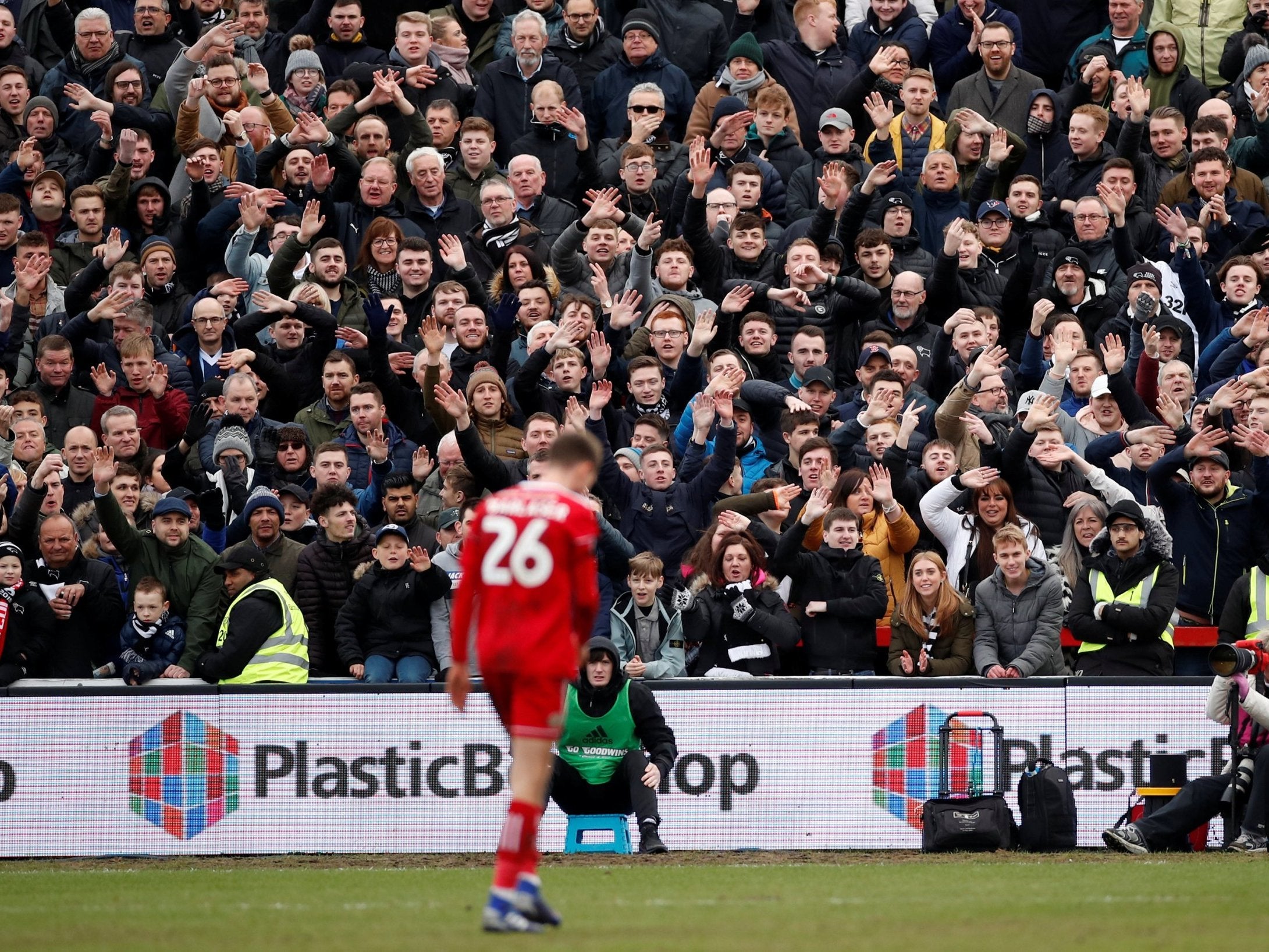 Daniel Barlaser walks off the field after being shown a red card in Accrington Stanley's FA Cup clash with Derby County