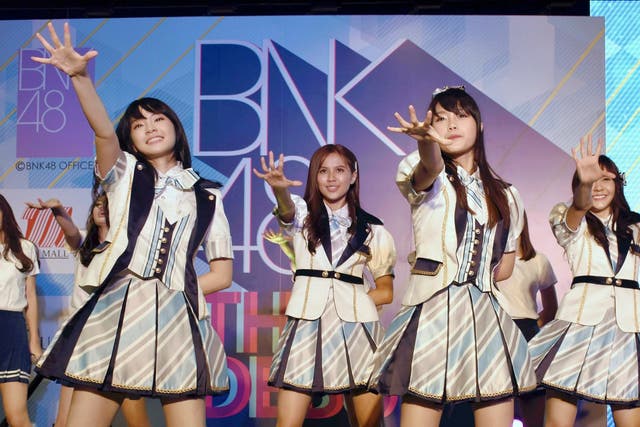The popular Thai music act BNK 48 has set off a scandal after one of its members wore a shirt showing the swastika flag of Nazi Germany during a performance