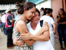 Hopes fade for hundreds missing as search suspended at Brazilian dam
