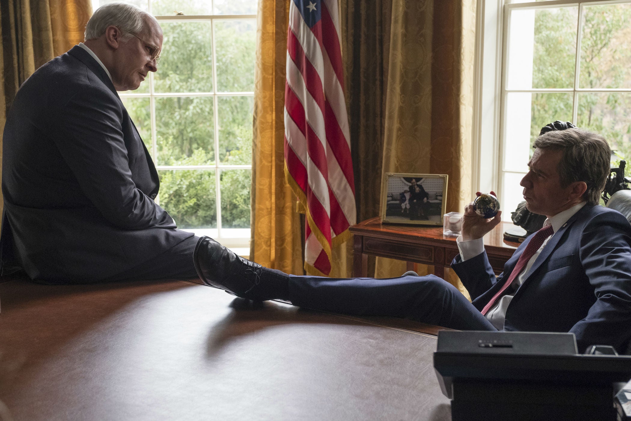 Office politics: Bale (left) and Sam Rockwell as vice president and president in the new film