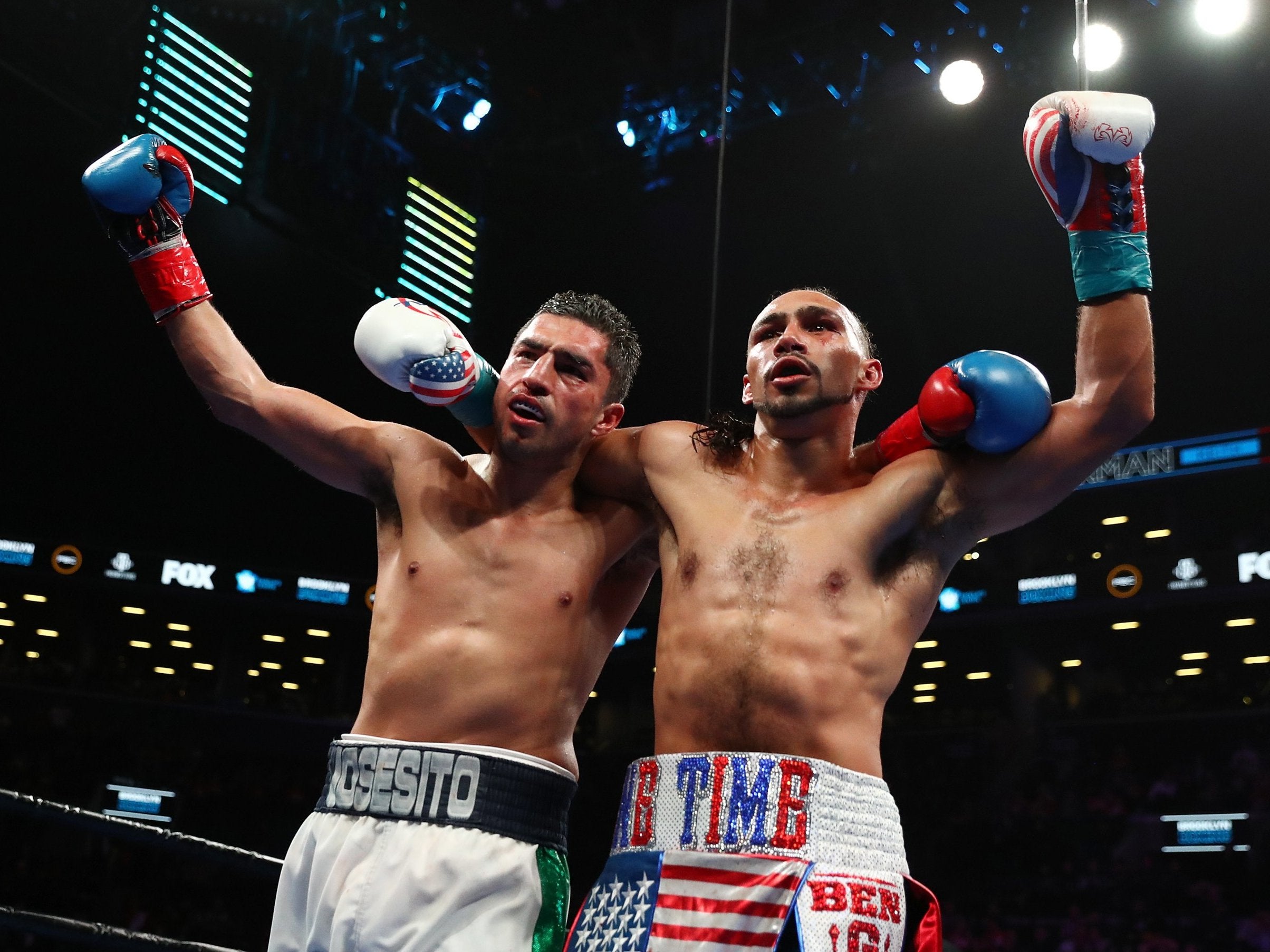 Keith Thurman and Josesito Lopez embrace after their fight (Getty )