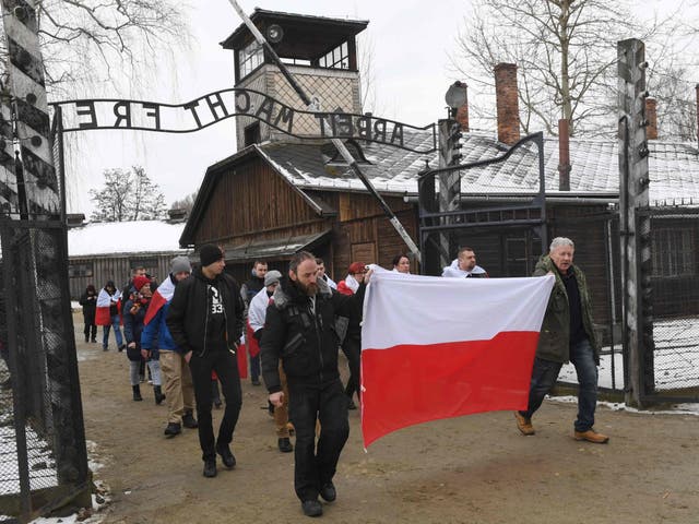 Far-right Polish nationalists demonstrate at Auschwitz during official Holocaust commemorations