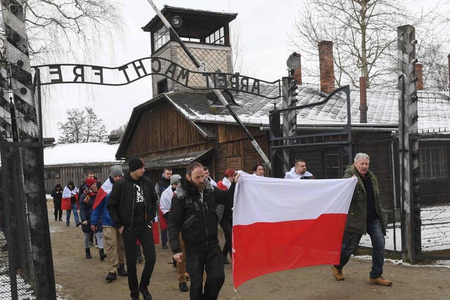 Far-right Polish nationalists demonstrate at Auschwitz during official Holocaust commemorations