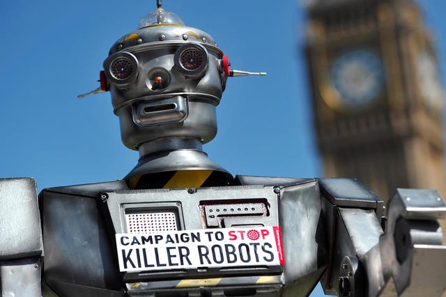 A mock 'killer robot' is pictured in central London on 23 April 2013 during the launching of Campaign to Stop 'Killer Robots,' which calls for the ban of lethal robot weapons that would be able to select and attack targets without any human intervention.