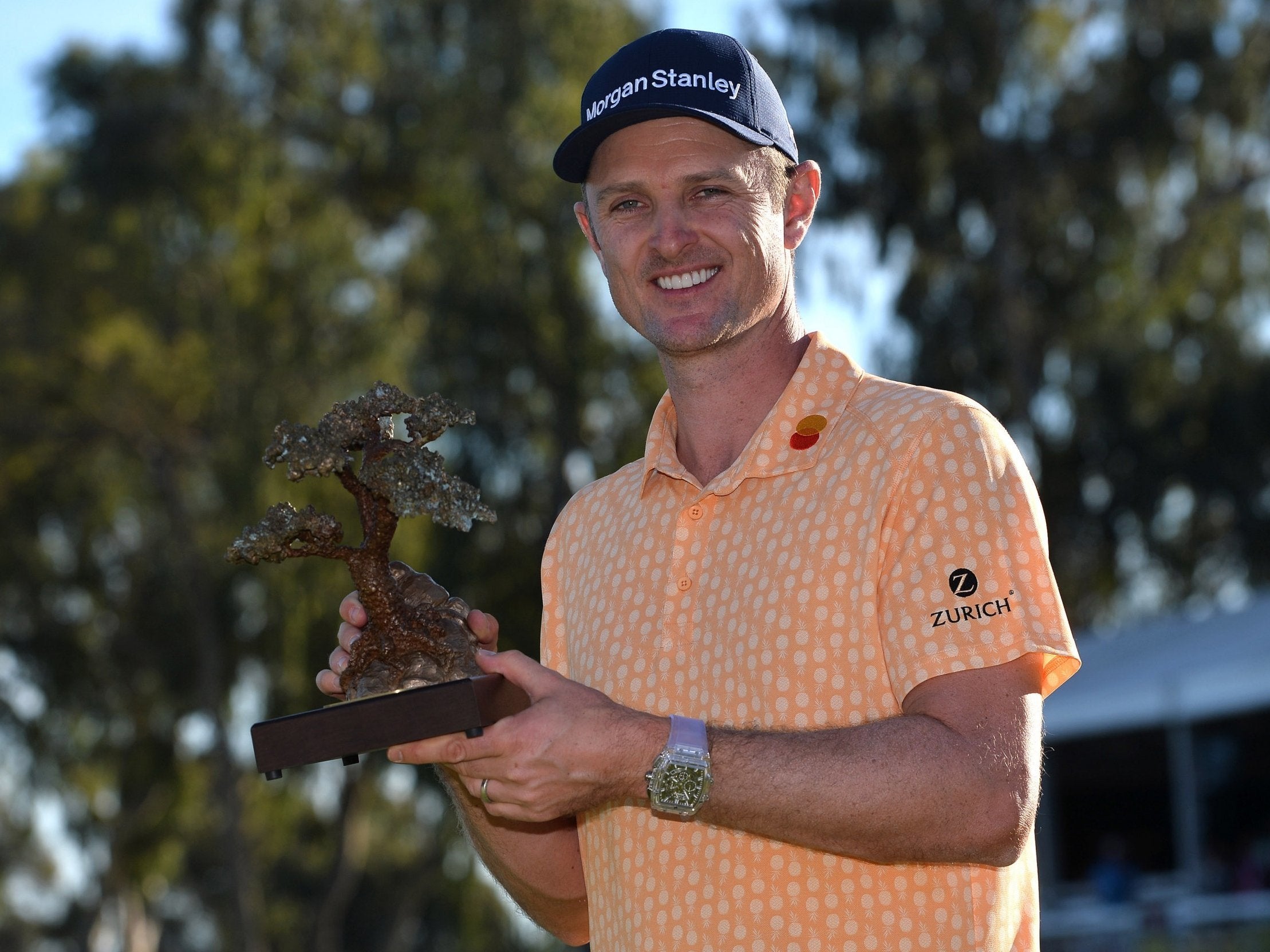 Justin Rose lifts the Farmers Insurance Open title