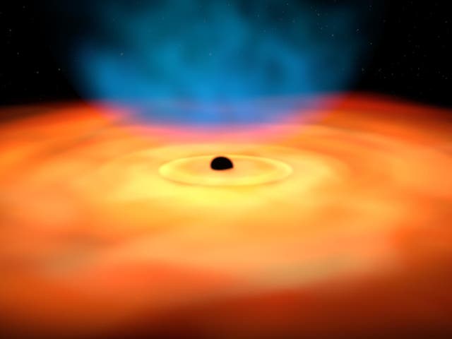 Artist’s impression showing a supermassive black hole at the core of a galaxy