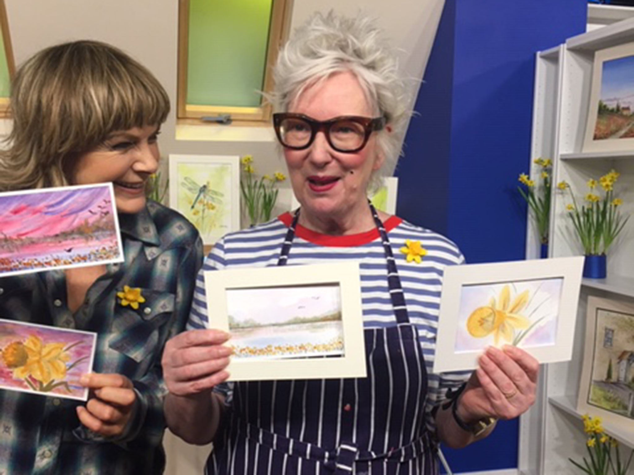 Jenny Eclair and Penny Smith show off the watercolours they painted to raise money for Marie Curie